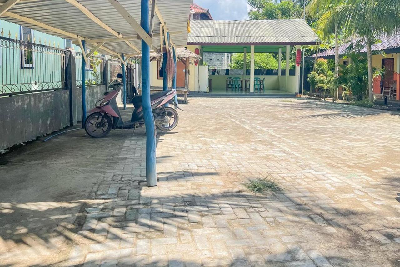 Ekas Beach Guesthouse Mitra Reddoorz Dış mekan fotoğraf